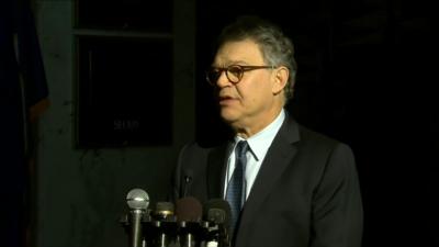 Al Franken speaking to the media