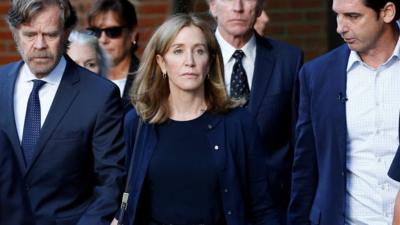 Felicity Huffman leaves court