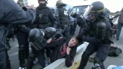 French police force protesters over Spanish border