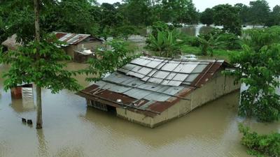 500 people have died in India's monsoon season but this farmer is refusing to leave his flooded home.