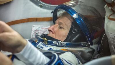 Tim Peake trying on the Sokol spacesuit he will wear during his flight to the International Space Station.