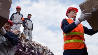 Chancellor of the Exchequer George Osborne visits an industrial area in the city of Urumqi in north west China