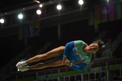 Oksana Chusovitina competing in gymnastics