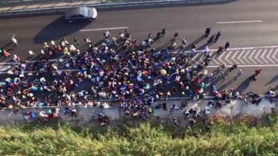 Migrants on their long walk to the Austrian border