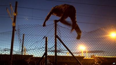 Man breaching fence