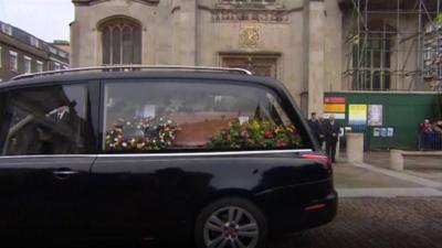 Hearse carrying Stephen Hawking's coffin