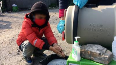 Young boy at a migrant camp