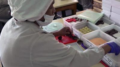 worker in a chocolate factory