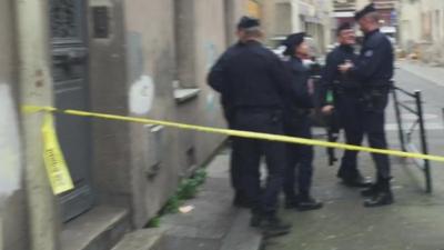 French police outside the raid Saint-Denis flat