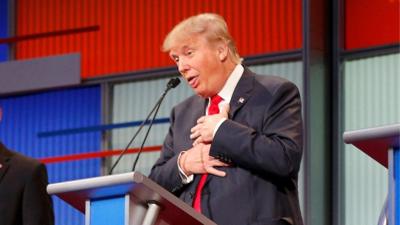 Donald Trump mocks Carson s belt buckle knife attack BBC News