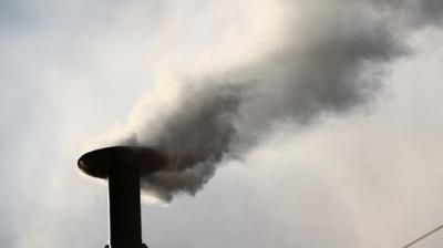 White smoke rises from the chimney on the Sistine Chapel