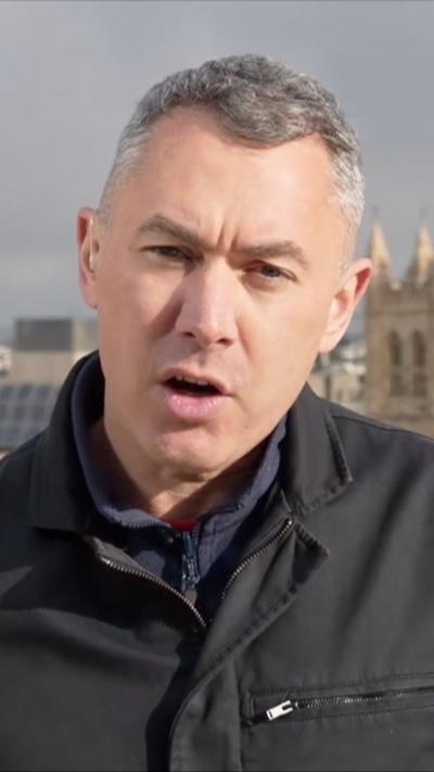 Daniel De Simone in a black jacket