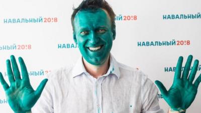 Alexei Navalny covered in green dye