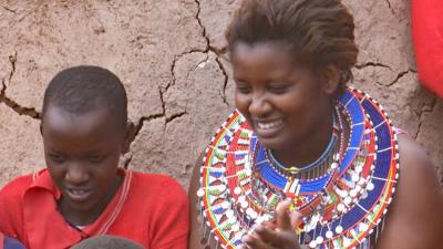 Nice Leng'ete talking with local children