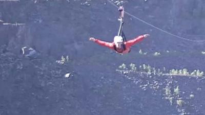 Man on zip line