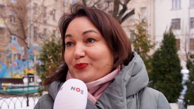 A Russian mother being interviewed outside in Winter