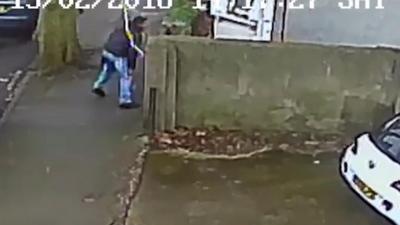 Allcie Houlder throwing a knife away