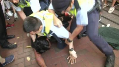 Police clash with protesters in Hong Kong