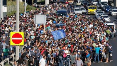 Migrants walk out of Budapest, Hungary