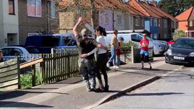 People dancing in the street