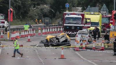 Emergency vehicles at site of Shoreham jet crash