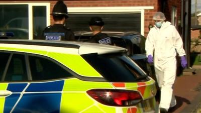 Forensic officer outside the house in Kidderminster