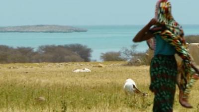 A woman walking on an island in the Dahlak Archipelago