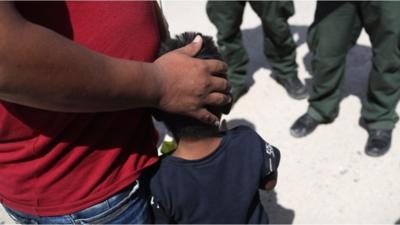 Father and child with border patrol