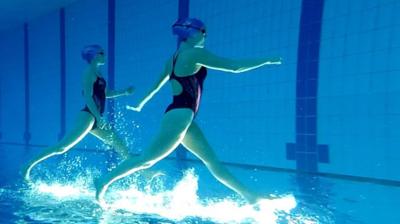 Kate and Izzy underwater