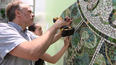 With continuing controversy and doubts over what memorial is best for Grenfell Tower, the community itself has created its own spontaneous memorials.