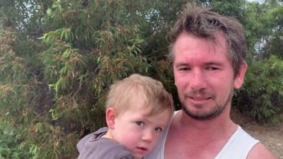 A runner with his child on Kangaroo Island