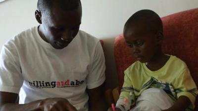 Ethan Suglo and his dad Charles