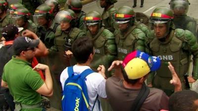 Protesters facing army