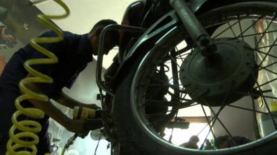 Mechanic working on a bike