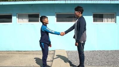 Tourists at fake DMZ