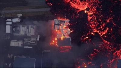 Lava surrounding a house