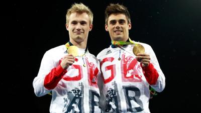 Jack Laugher and Chris Mears hold their gold medals.