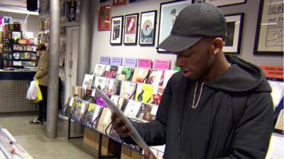 Man buying records