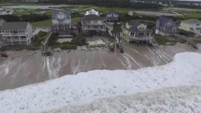 Rising tide approaches coastal homes