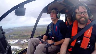 Reporter Tim Mcdonald on a pub crawl via helicopter