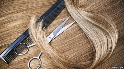 A generic image of hair, scissors and a comb