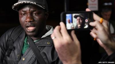 Tears and relief as people return from The Gambia