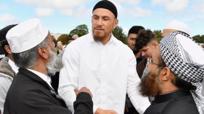 Sonny Bill Williams meeting people by a mosque