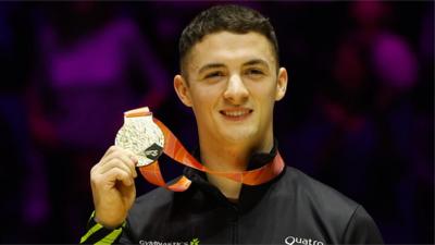 Rhys McClenaghan with his gold medal