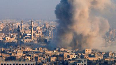 Smoke rises from a rebel-held area of Aleppo, Syria (12 December 2016)