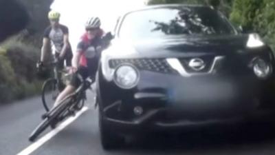 Car driver punches cyclist