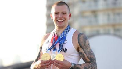 Adam Peaty with two gold and one silver Olympic medals