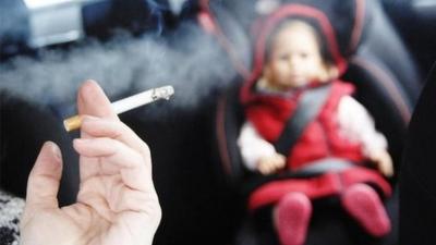 Smoking in a car with a child