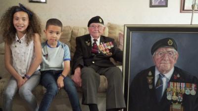 Two kids with their great-granddad who was at the D-Day landings