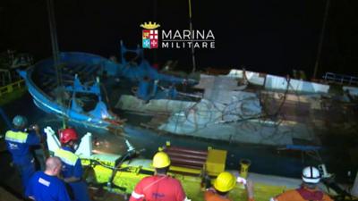 Timelapse footage of Italian navy raising boat from bottom of Mediterranean